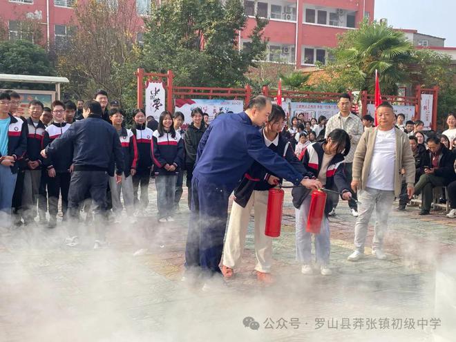 模拟演练提技能 强化教育铸平安 罗山县莽张镇初级中学举行“全市安全日”演练(图9)